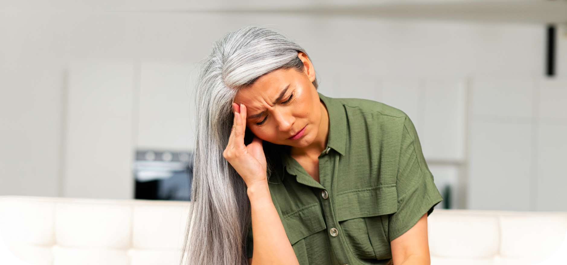 a woman having a headache